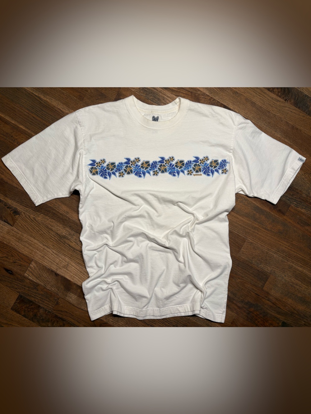 Y2K Speedo White Short-Sleeve Tee with Blue and Gold Floral Stripe